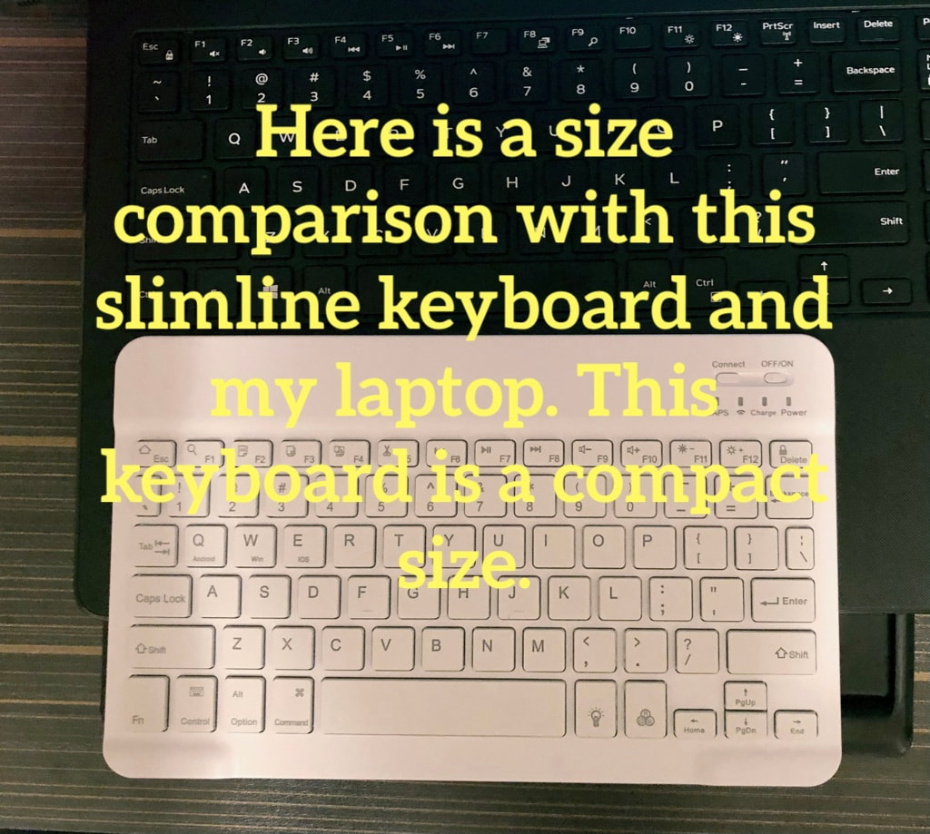 Bluetooth compact keyboard connects to phones. 