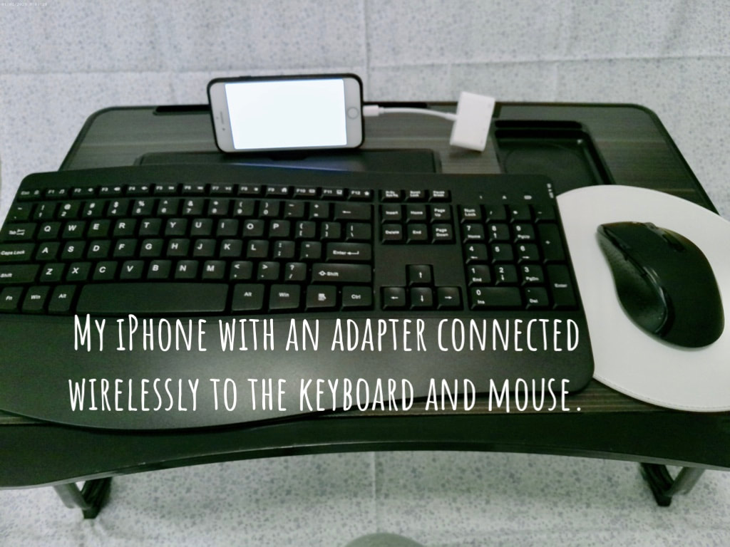 Adapter for iPhone to connect wireless keyboard and mouse. 