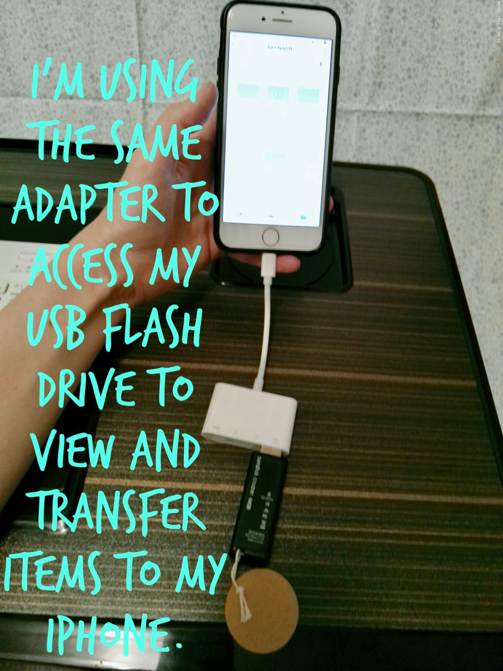 Adapter for iPhone to use USB flash drive. 