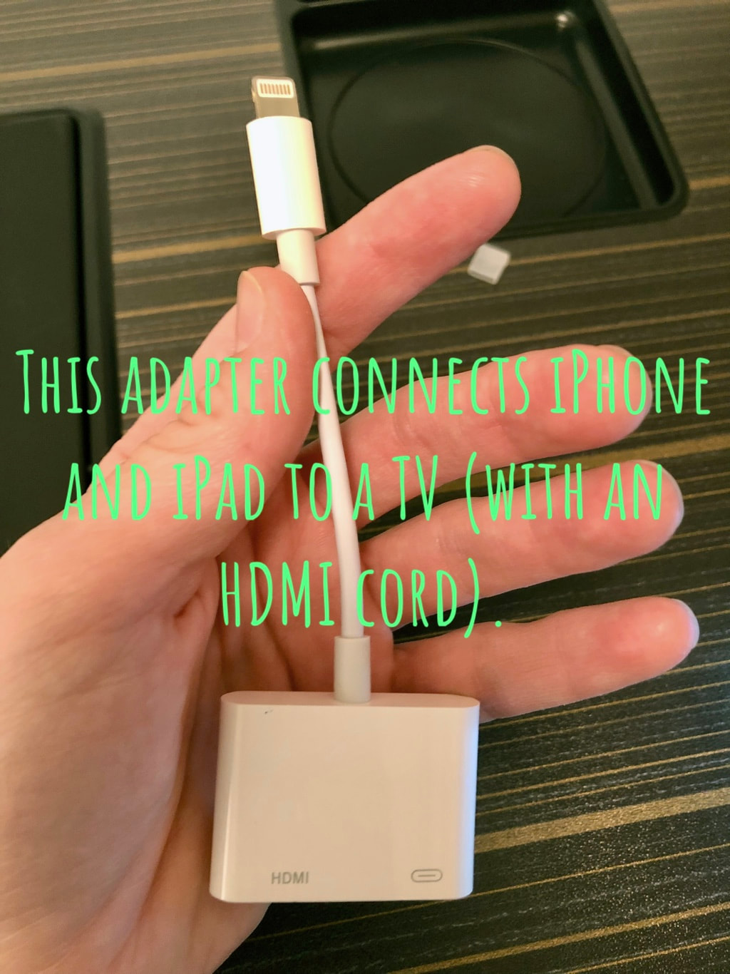 Adapter to connect iPhone and iPad to TV with an HDMI cord.